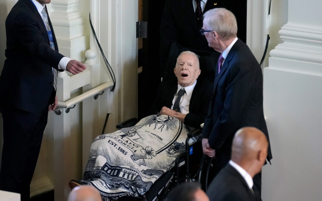 Jimmy Carter, 99, Makes A Rare Appearance At The Memorial Service For His Late Wife Rosalynn Carter